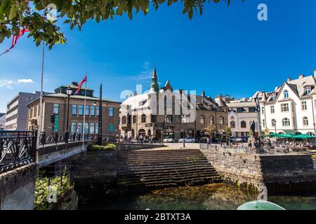 Alesund, Norway - June 2019: Summer view of Alesund port town on the west coast of Norway, at the entrance to the Geirangerfjord. Old architecture of Stock Photo
