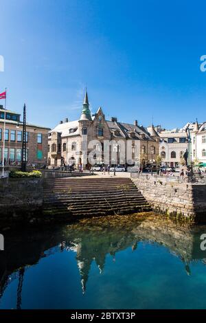 Alesund, Norway - June 2019: Summer view of Alesund port town on the west coast of Norway, at the entrance to the Geirangerfjord. Old architecture of Stock Photo