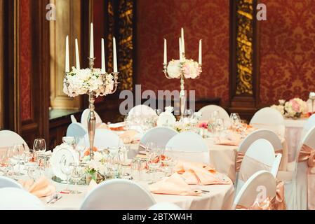 Simple and elegant wedding or festive table setting. beige colors Stock Photo