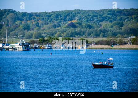 Vitte, Germany. 25th May, 2020. The Baltic Sea island of Hiddensee can be seen from the Baltic Sea. Credit: Jens Büttner/dpa-Zentralbild/ZB/dpa/Alamy Live News Stock Photo