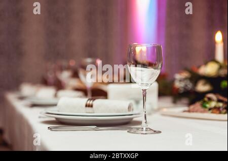 Simple and elegant wedding or festive table setting. Stock Photo