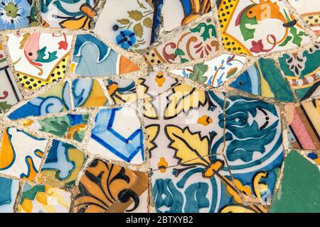 Detail of Gaudí's mosaic work in the bench at Park Guell, Barcelona, Catalonia, Spain