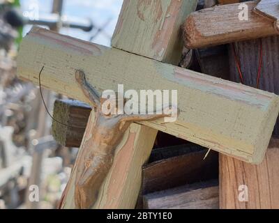 Jesus christ on wooden cross Stock Photo