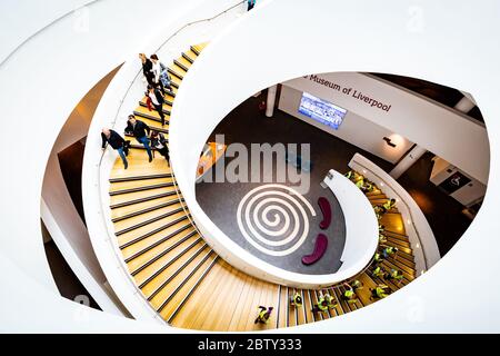 The spiral staircase in the Museum of Liverpool that forms part of the famous waterfront along the River Mersey, Liverpool, Merseyside, England, Unite Stock Photo