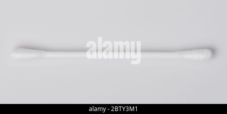 Close up of single cotton bud isolated on white Stock Photo - Alamy
