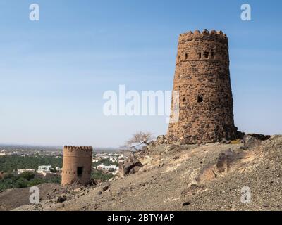 Remains of the mud and clay watch towers in the village of Mudayrib, Sultanate of Oman, Middle East Stock Photo