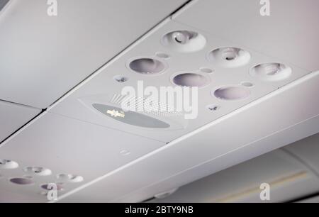 Lighting and air conditioning control panel in an aircraft cabin. Stock Photo