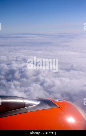 View of an engine on an Easyjet aircraft taken from inside the cabin. Stock Photo