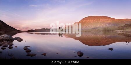 Cregennan lakes and mountain reflection at sunset in Snowdonia National Park, North Wales, United Kingdom, Europe Stock Photo