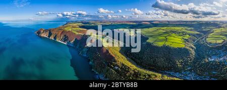 Aerial view over Exmoor National Park coastline, Lynton and Lynmouth, North Devon, England, United Kingdom, Europe Stock Photo
