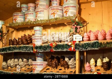 Vienna,Austria, 27th of November 2019: Vienna Christmas market stall with a big variety of sweets and desserts, candy floss, chocolate and strawberry Stock Photo