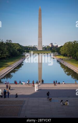 Washington, DC / USA - May 25, 2020: Many people visit the National Mall on Memorial Day, despite the COVID-19 pandemic. Stock Photo