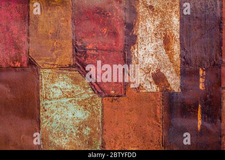 rusted tin sheets patchwork wall texture and flat background Stock Photo