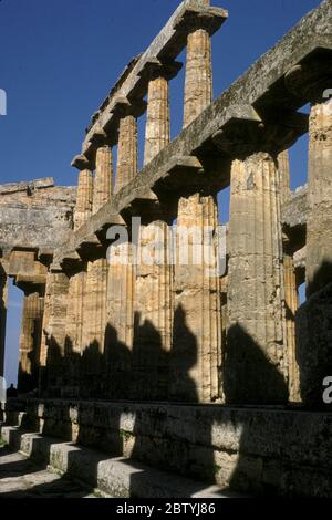 Temples in the ancient Greek city of Paestum on the coast of the Tyrrhenian Sea in the province of Salerno, Campania, Italy Stock Photo