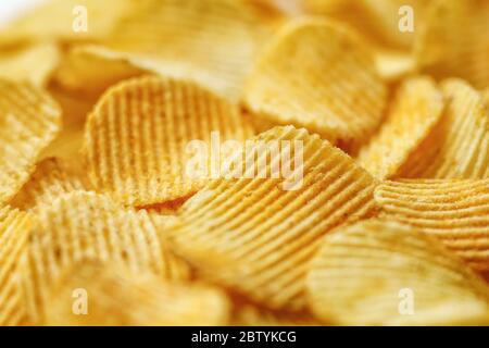 Corrugated Potato Chips. Close-up macro view. Stock Photo