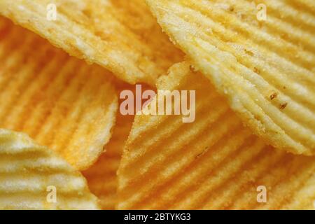 Corrugated Potato Chips. Close-up macro view. Stock Photo