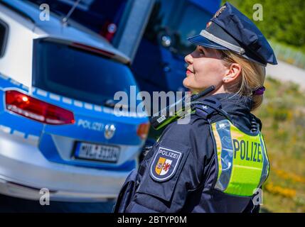 28 May 2020, Mecklenburg-Western Pomerania, Schwerin: Superintendent Katrin Hilberling is wearing one of the new overt vests for equipment which was officially presented by the Mecklenburg-Vorpommern state police. The so-called 'outer cover' is a vest that provides additional protection for the police officers and makes it easier to store equipment. Police officers have contributed to the development of the new model with their practical experience. Photo: Jens Büttner/dpa-Zentralbild/dpa Stock Photo