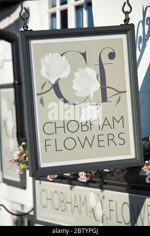 Sign outside Chobham Flowers florist shop in Chobham, Surrey, England, UK Stock Photo