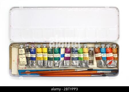 Watercolor tubes in box, isolated on a white background Stock Photo