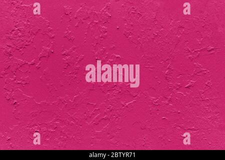 seamless texture of flat thick painted boudoir red surface under direct sunlight Stock Photo