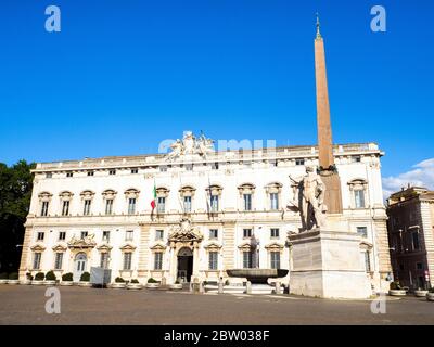 Palazzo della Consulta (built 1732-1735) is a late Baroque palace in central Rome, Italy, that since 1955 houses the Constitutional Court of the Italian Republic. It sits across Piazza del Quirinale from the official residence of the President of the Italian Republic, the Quirinal Palace Stock Photo
