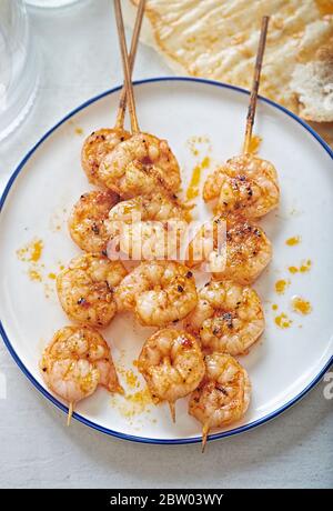 Prawn shrimps wooden skewers marinated Stock Photo
