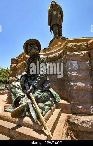 Pretoria, South Africa - Dec 18, 2011: Statue of anonymous Boer citizen-soldiers alongside that of Paul Kruger in Church Square, Pretoria. Stock Photo