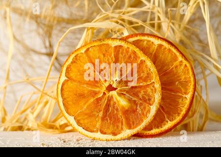 Two slices of dried orange fruit Stock Photo