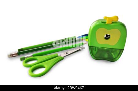 stationery green color. mechanical sharpener and pencil. writing instruments isolated on white Stock Photo