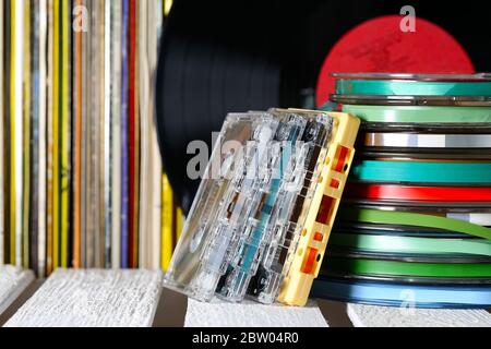 Music tapes and vinyl records are on the shelf Stock Photo
