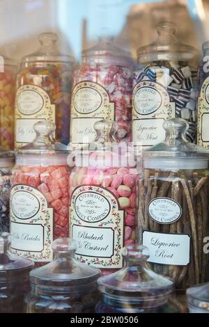 Traditional sweetshop window display in Stow on the Wold, Cotswolds, Gloucestershire, England UK Stock Photo