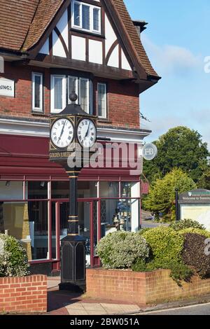 Village centre showing Golden Jubilee Clock and Farrow & Ball shop, Chobham Road, Sunningdale, Berkshire, England, United Kingdom Stock Photo