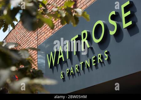 Waitrose Supermarket Sign on a store in Weybridge, Surrey, England, UK Stock Photo