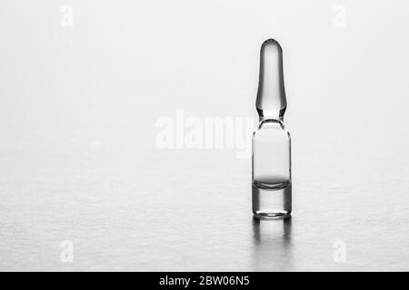 Single Medical glass ampules on white background Stock Photo