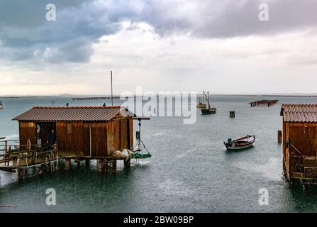 Italy Veneto - Delta Po national Park- Sacca di Scardovari- Home Fishing and Boats - On a rainy day Stock Photo