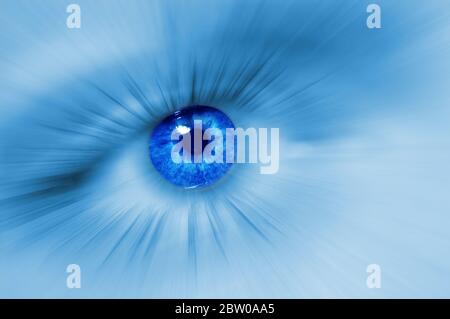 Macro blue eye. Divergent abstract rays from the pupil of the human eye. Concept of  dreams or abstraction, purity or treatment of vision.  Macro Stock Photo