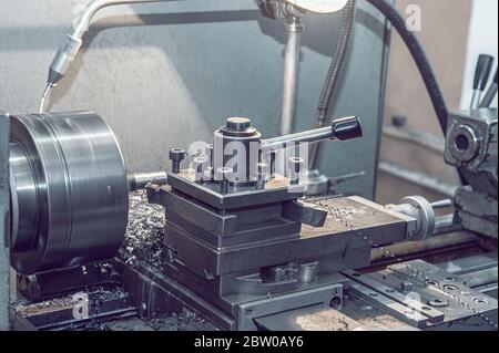 old Metalworking machine, manufactured in the middle of the last century, is still in good condition. The use of old technologies in times of crisis a Stock Photo