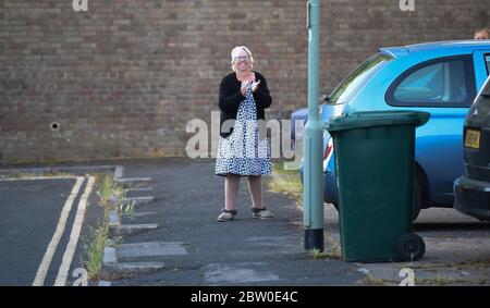 Brighton UK 28th May 2020 - Residents and neighbours of Queens Park in Brighton join in the Clap For Our Carers for NHS staff and Key Workers tonight during the coronavirus COVID-19 pandemic . : Credit Simon Dack / Alamy Live News Stock Photo