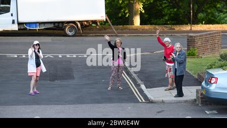 Brighton UK 28th May 2020 - Residents and neighbours of Queens Park in Brighton join in the Clap For Our Carers for NHS staff and Key Workers tonight during the coronavirus COVID-19 pandemic . : Credit Simon Dack / Alamy Live News Stock Photo