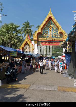 dh Wat chalong Buddhist temple PHUKET THAILAND Tourist walking through market streets Stock Photo