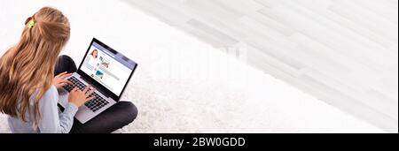 Child Girl Using Social Media On Laptop Stock Photo