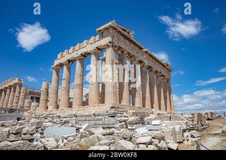 Athens Acropolis, Greece. Parthenon temple facade side view, ancient temple ruins, blue sky background in spring sunny day. Stock Photo