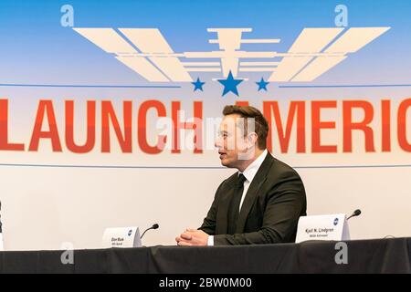 Elon Musk, founder of Space Exploration Technologies Corp.- SpaceX, joins President Donald J. Trump at a launch briefing in preparation for the launch of the SpaceX Falcon 9 rocket with the Crew Dragon vehicle Wednesday, May 27, 2020, at the Kennedy Space Center in Cape Canaveral, Florida. (USA) Stock Photo