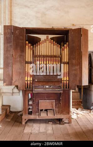 Rare, one of only seven in state, pipe organ at Saviour of the World Church, Loutolim, Goa, India. The instrument is not in working condition. Stock Photo