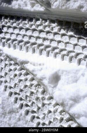 Tire tracks in snow. Stock Photo