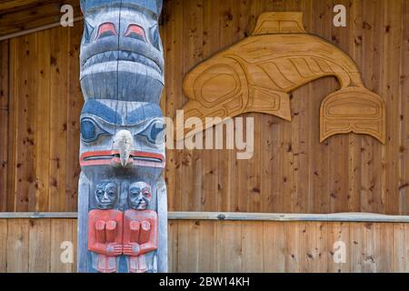 Clan House & Totem Pole, Icy Strait Point, Hoonah City, Chichagof Island, Southeast Alaska, USA Stock Photo