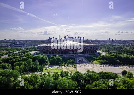 (200529) -- WARSAW, May 29, 2020 (Xinhua) -- The National Stadium is seen with the city skyline in the background in Warsaw, Poland, on May 28, 2020. The Polish government announced on Wednesday further easing of anti-coronavirus restrictions, as the country reported 399 new confirmed cases of COVID-19 infection over the past 24 hours. With 300 to 400 new cases discovered on a daily basis, the curve shows no signs of flattening in Poland. So far, 22,473 people have been infected with the coronavirus and 1,028 patients succumbed to the coronavirus-caused disease. (Photo by Jaap Arriens/Xinh Stock Photo