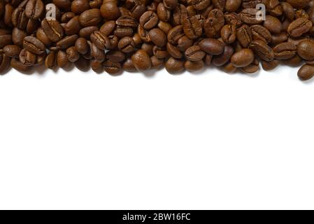 Texture of coffee beans. Roasted coffee beans background. close up Coffee beans with copy space on White background Stock Photo