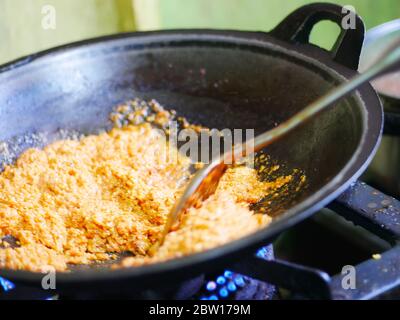 Chef Stir Fry Seasoning In Wok Stock Photo