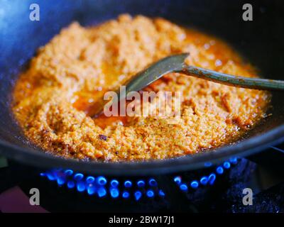 Chef Stir Fry Seasoning In Wok Stock Photo